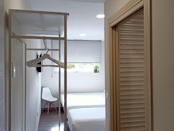 Pensión Boutique AdMera Cerca hospital Clínico : photo 5 de la chambre chambre triple