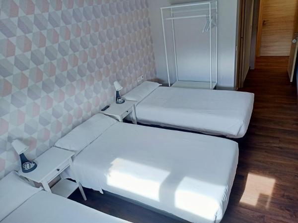 Pensión Boutique AdMera Cerca hospital Clínico : photo 4 de la chambre chambre triple