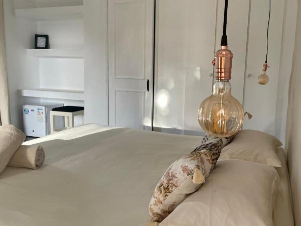 Sous le Badamier Cosy Guest House : photo 2 de la chambre chambre triple supérieure