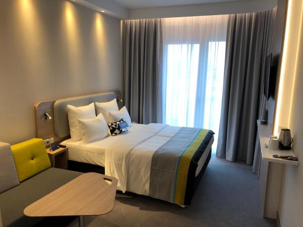 Holiday Inn Express Munich - City East, an IHG Hotel : photo 5 de la chambre chambre lit queen-size avec canapé-lit