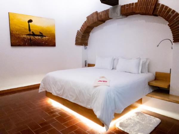 Agrado Guest House : photo 1 de la chambre suite - vue sur jardin