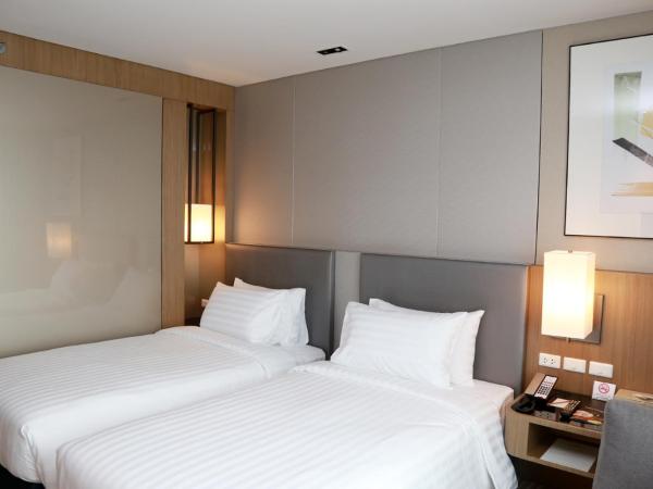 Asawin Grand Convention Hotel : photo 4 de la chambre chambre lits jumeaux