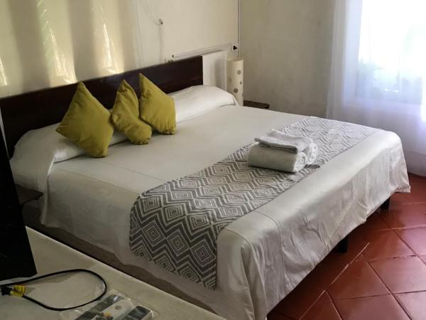 Maria's Kan Kin : photo 6 de la chambre chambre lit king-size