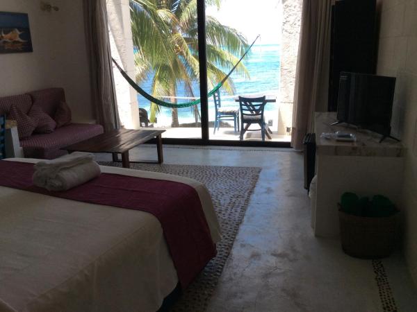 Maria's Kan Kin : photo 9 de la chambre chambre lit king-size - vue sur océan