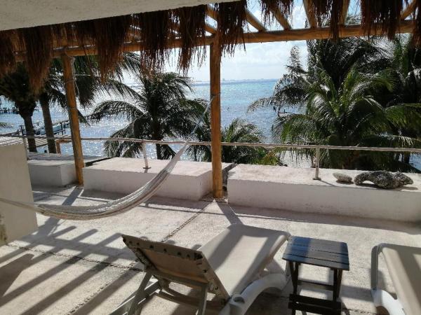 Maria's Kan Kin : photo 10 de la chambre chambre lit king-size - vue sur océan