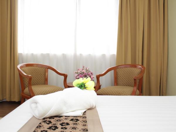 Hotel Sandakan : photo 8 de la chambre chambre deluxe double ou lits jumeaux