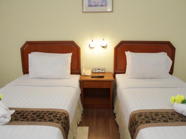 Hotel Sandakan : photo 10 de la chambre chambre deluxe double ou lits jumeaux