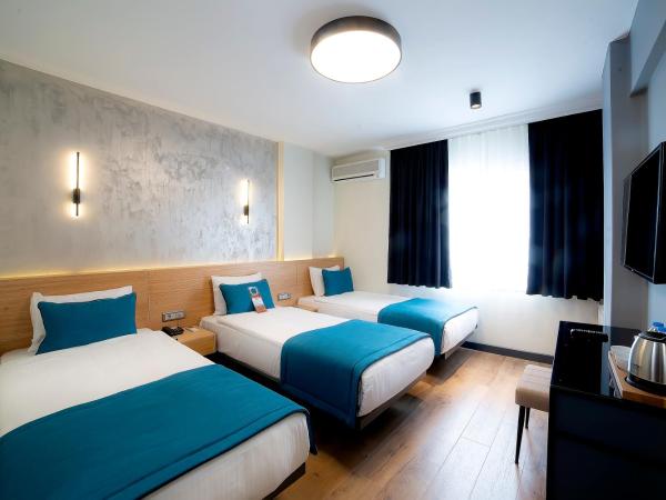 Barin Hotel : photo 1 de la chambre chambre triple standard