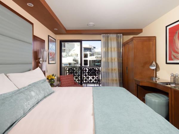 Cormorant Boutique Hotel : photo 2 de la chambre chambre lit king-size - vue sur mer