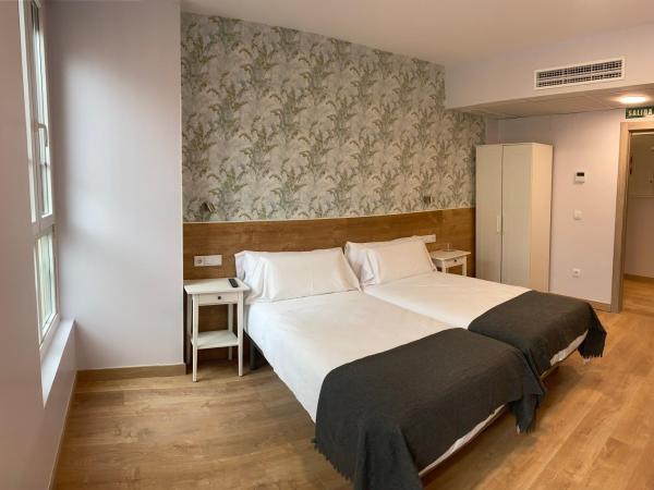Aloha Hostel : photo 1 de la chambre chambre lits jumeaux avec salle de bains privative