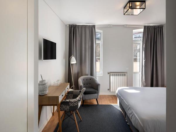 NJOY Coimbra : photo 8 de la chambre suite avec terrasse