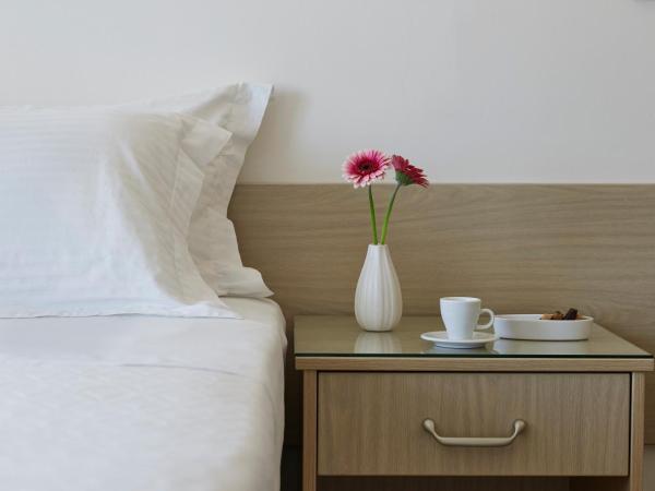 Amarilia Hotel : photo 3 de la chambre chambre double ou lits jumeaux