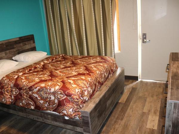 Miami Inn & Suites : photo 2 de la chambre chambre lit queen-size 