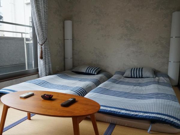 Auberge du Tanuki Noir Maison d'Hôtes : photo 1 de la chambre chambre familiale