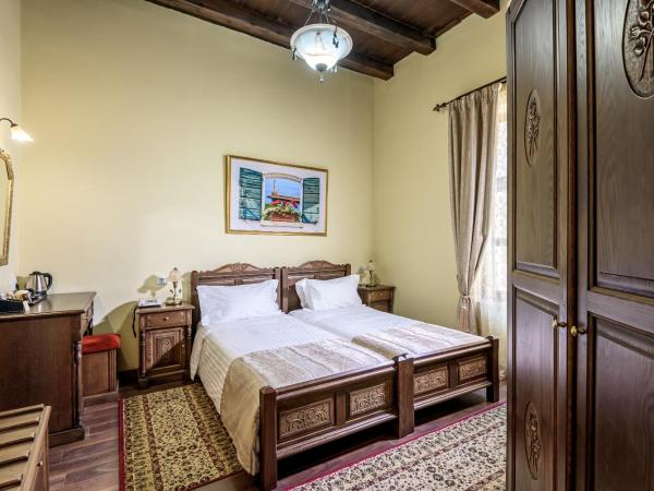 Porto Del Colombo Traditional Boutique Hotel : photo 10 de la chambre chambre double ou lits jumeaux - vue sur ville