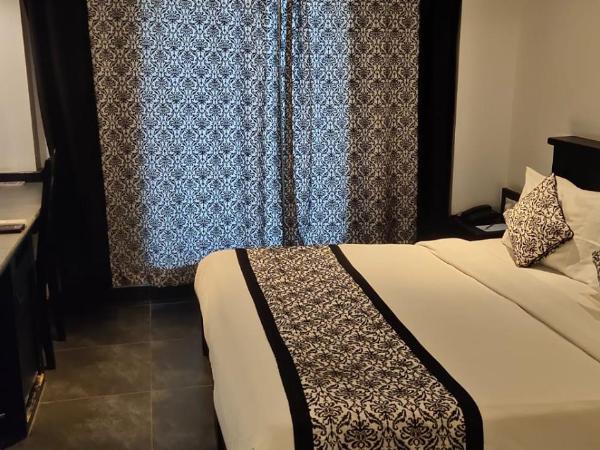 Liwa - The Transit Hotel, Bengaluru : photo 3 de la chambre chambre lit king-size