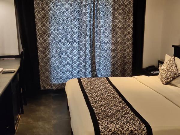 Liwa - The Transit Hotel, Bengaluru : photo 2 de la chambre chambre lit king-size