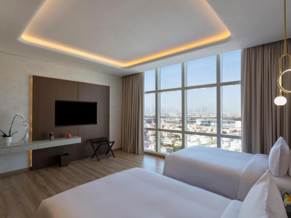 Movenpick Jumeirah Village Triangle : photo 3 de la chambre chambre lits jumeaux deluxe - vue panoramique sur ville