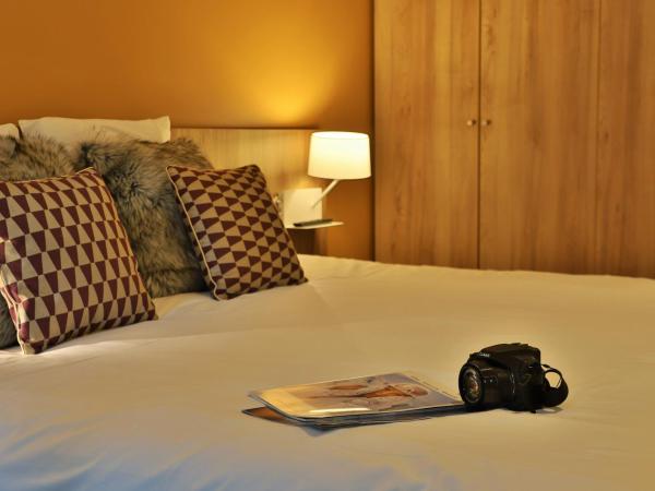 SOWELL HOTELS Mont Blanc et SPA : photo 5 de la chambre chambre quadruple - vue sur montagnes