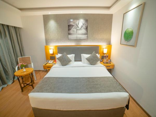 Zip By Spree Hotels Chakan : photo 3 de la chambre chambre deluxe double ou lits jumeaux