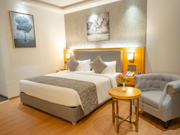 Zip By Spree Hotels Chakan : photo 1 de la chambre chambre lit king-size