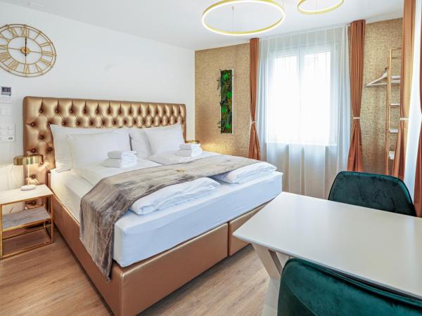 EH Apartments Merkur : photo 3 de la chambre studio lit king-size