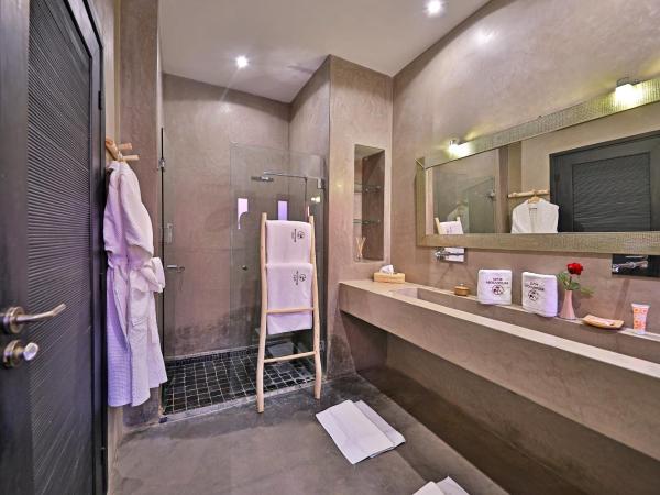 DAR NOUJOUM : photo 4 de la chambre chambre lit king-size - vue sur piscine 