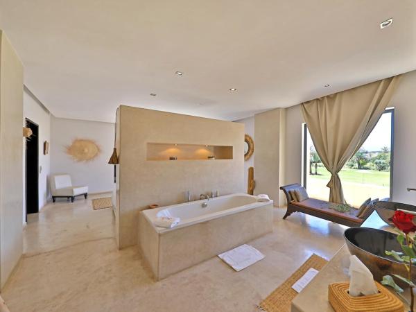 DAR NOUJOUM : photo 3 de la chambre chambre lit king-size - vue sur montagne