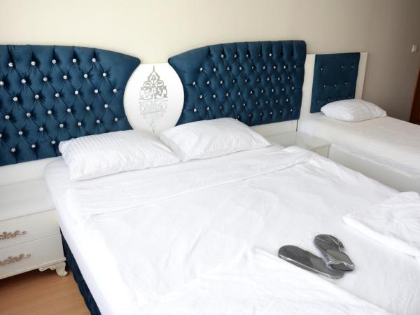 palmiye suıt otel : photo 4 de la chambre studio familial