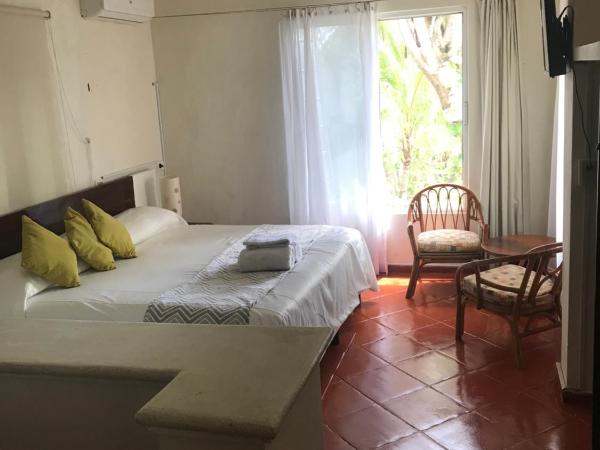 Maria's Kan Kin : photo 3 de la chambre chambre lit king-size