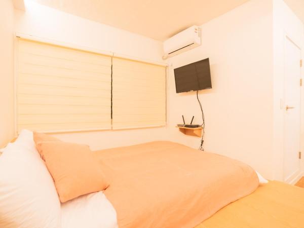 Huayuanhouse HQ in hongdae : photo 1 de la chambre chambre double avec salle de bains privative