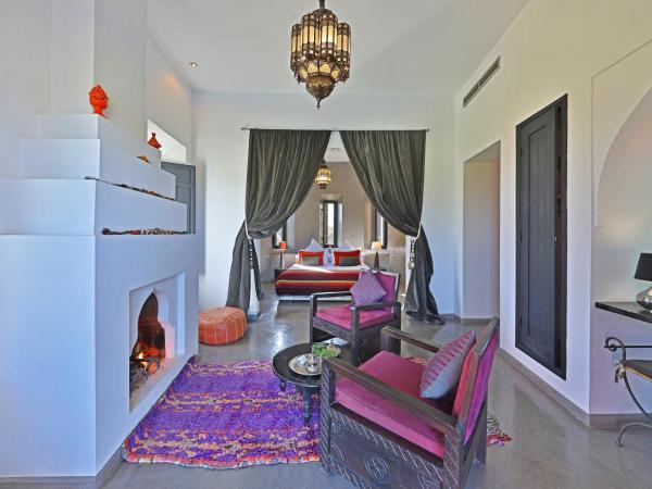 DAR NOUJOUM : photo 3 de la chambre chambre lit king-size - vue sur piscine 