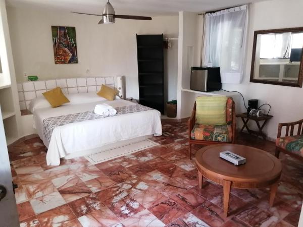 Maria's Kan Kin : photo 7 de la chambre chambre lit king-size