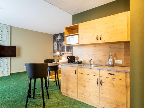 mightyTwice Hotel Dresden : photo 4 de la chambre grand chambre doubles avec kitchenette - roomy