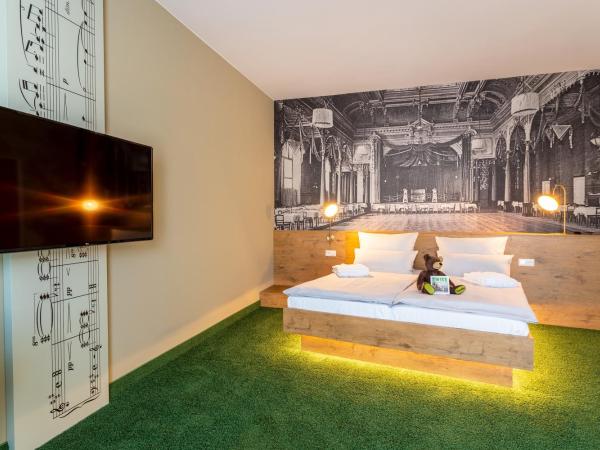 mightyTwice Hotel Dresden : photo 5 de la chambre grand chambre doubles avec kitchenette - roomy