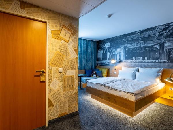 mightyTwice Hotel Dresden : photo 1 de la chambre chambre double lit queen-size - cosy