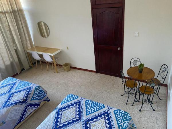 CASA CEMPOAL : photo 7 de la chambre chambre quadruple avec salle de bains commune