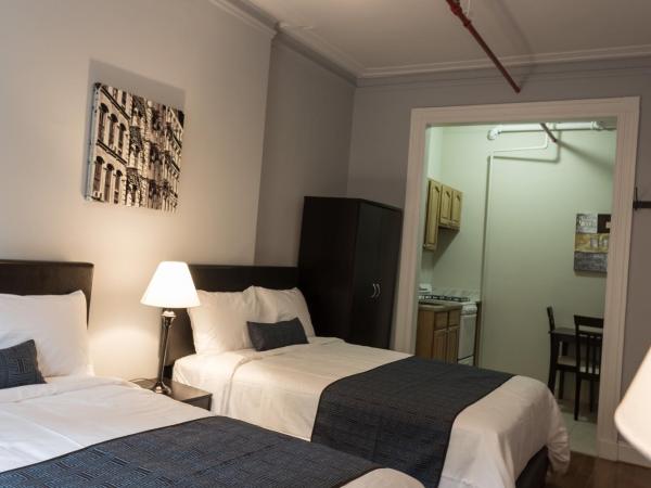 The Central Park North : photo 2 de la chambre chambre quadruple standard avec salle de bains commune