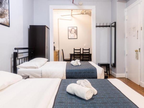 The Central Park North : photo 4 de la chambre chambre quadruple standard avec salle de bains commune