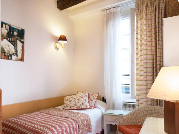 Hôtel du Cygne Paris : photo 1 de la chambre chambre simple standard