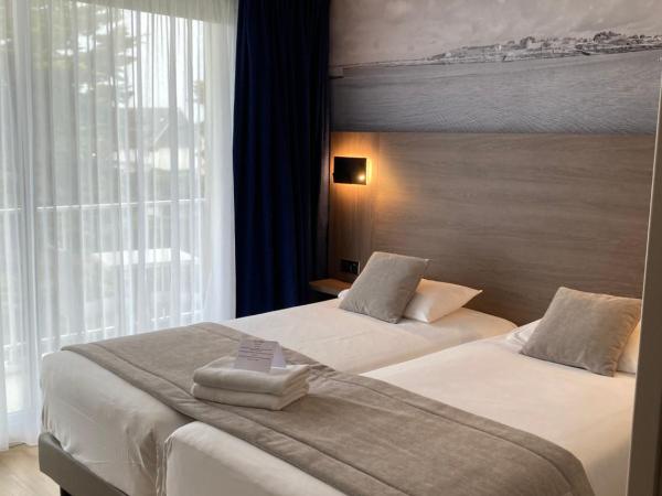 Hotel Europa : photo 3 de la chambre chambre triple familiale - vue sur jardin (2 adultes + 1 enfant) 