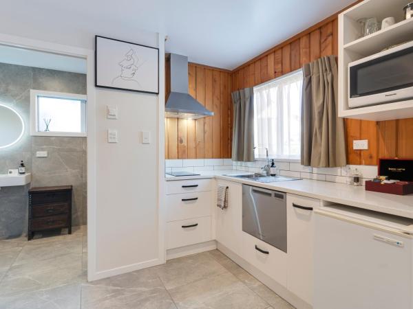 Archway Motels & Chalets : photo 2 de la chambre chalet avec accès supérieur