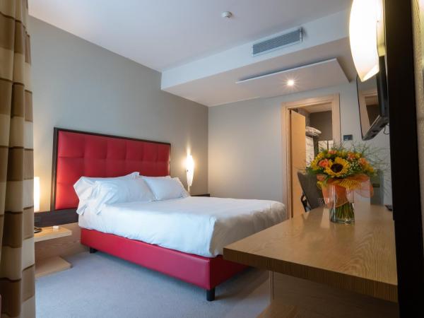 UNAHOTELS MH Matera : photo 1 de la chambre chambre familiale