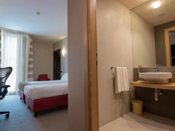 UNAHOTELS MH Matera : photo 3 de la chambre chambre familiale