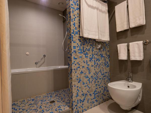 UNAHOTELS MH Matera : photo 5 de la chambre chambre familiale