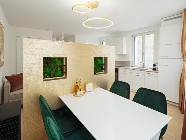 EH Apartments Merkur : photo 6 de la chambre suite supérieure lit king-size