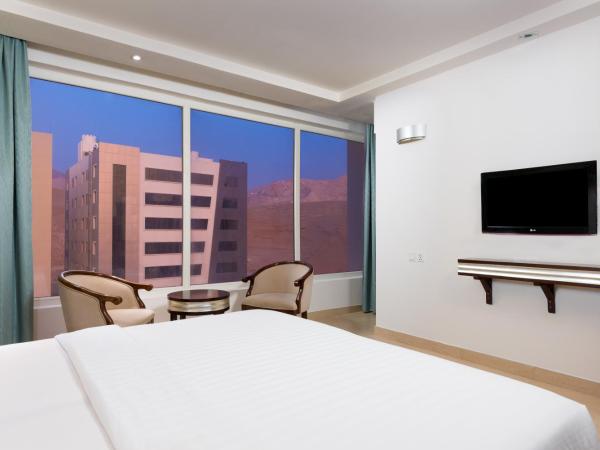 Centara Life Muscat Dunes Hotel : photo 4 de la chambre suite deluxe avec lit king-size