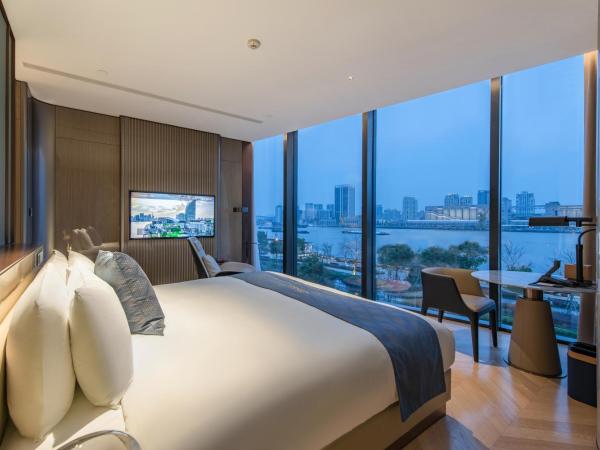 Prodor Hotel Shanghai : photo 3 de la chambre chambre lit king-size deluxe - vue sur rivière
