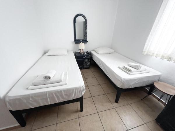 Kaya Apart & Pansiyon : photo 4 de la chambre chambre double ou lits jumeaux avec salle de bains