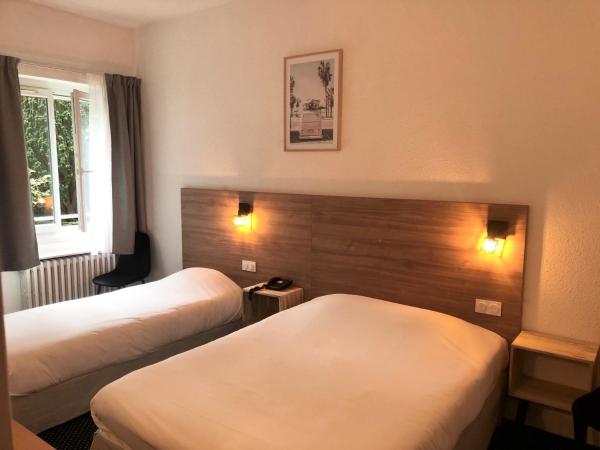 Hotel Le Progres : photo 4 de la chambre chambre lits jumeaux